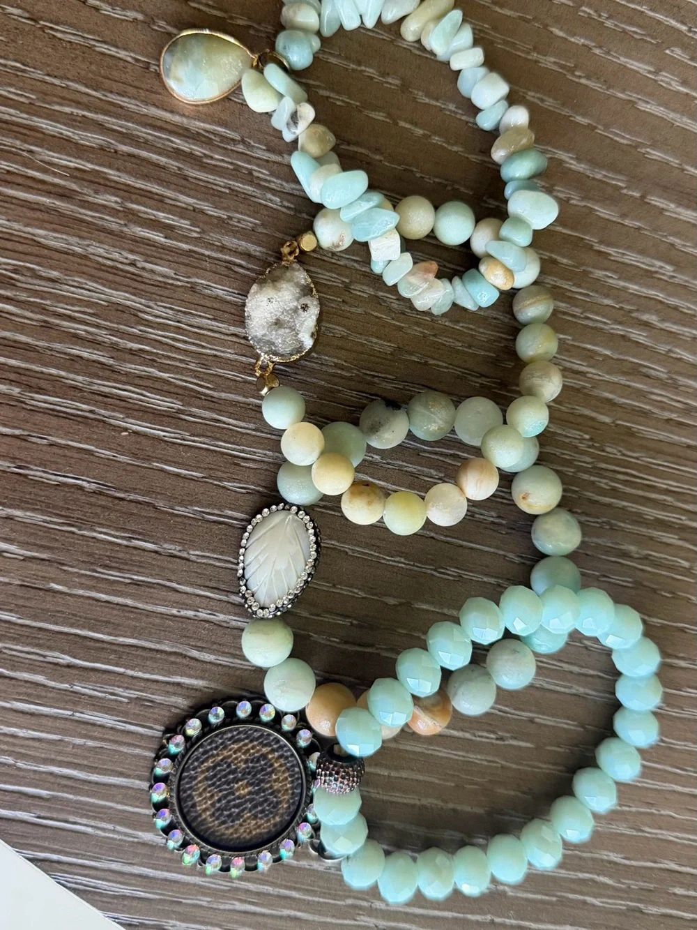 Handcrafted Mint Beaded Bracelet Stack with Crystal and Medallion LV bag.